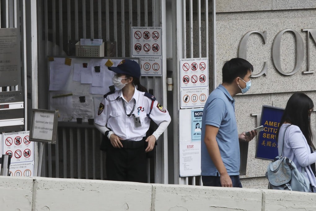 Security guards stand guard in front of Consulate General of the United States, Hong Kong and Macau in Central. Photo: SCMP / K. Y. Cheng