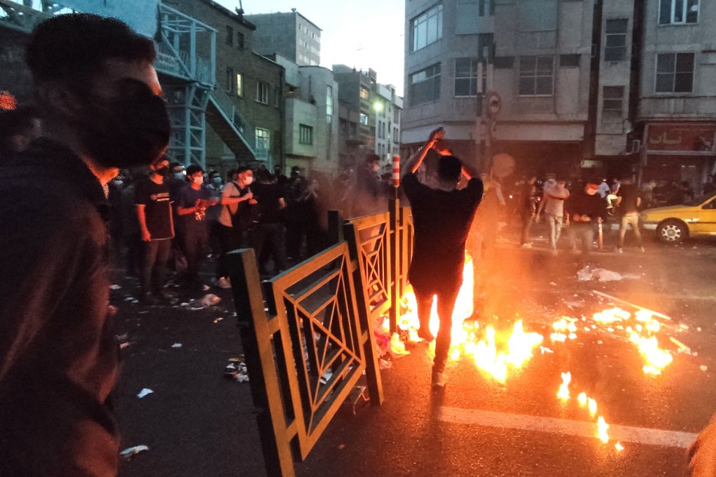 Iranian demonstrators take to the streets in Tehran during a protest for Mahsa Amini, days after she died in police custody. Photo: TNS