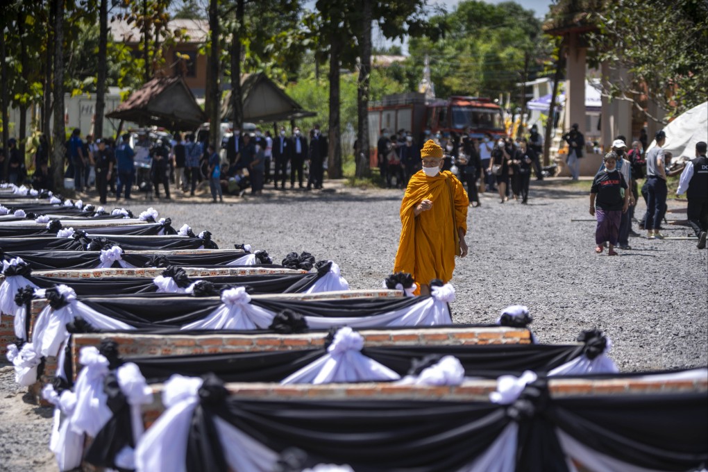 Funeral pyres for victims of Thailand’s nursery school massacre. Photo: dpa