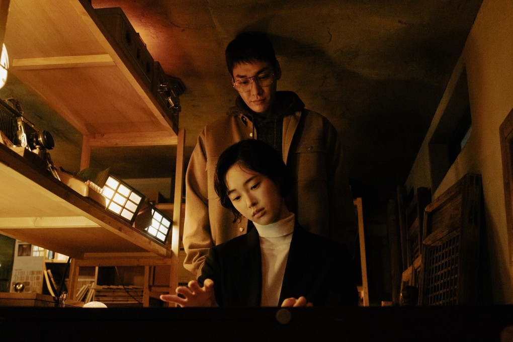 Kang Hae-lim (front) as Kim Sum and Kim Young-kwang as Sung Yun-oh in a still from Somebody, a darkly compelling Netflix K-drama that premiered at the Busan International Film Festival.