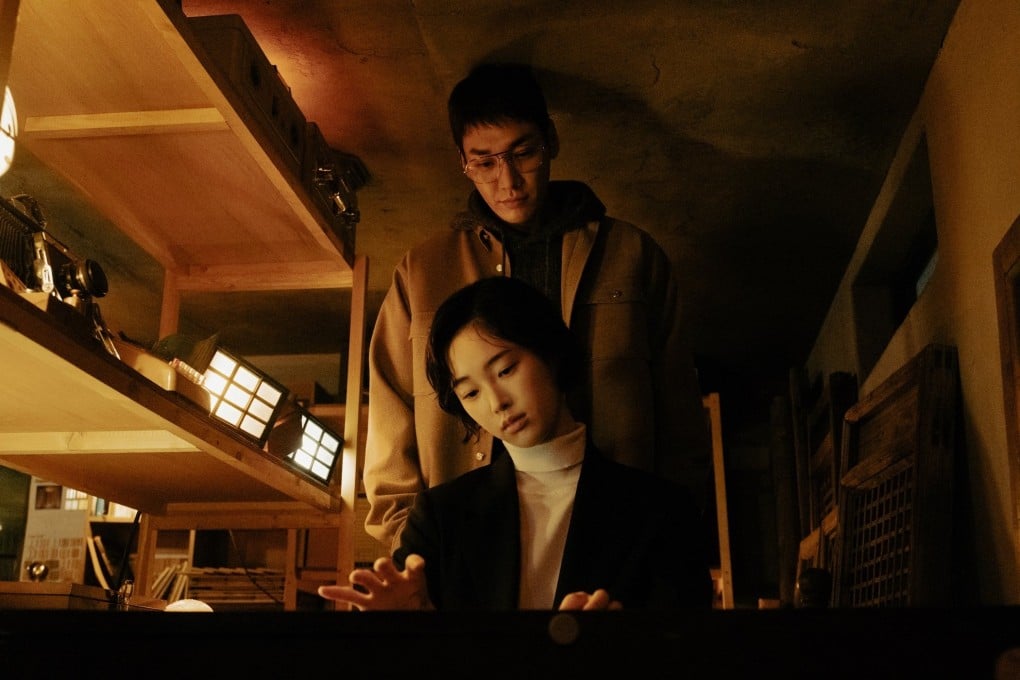 Kang Hae-lim (front) as Kim Sum and Kim Young-kwang as Sung Yun-oh in a still from Somebody, a darkly compelling Netflix K-drama that premiered at the Busan International Film Festival.
