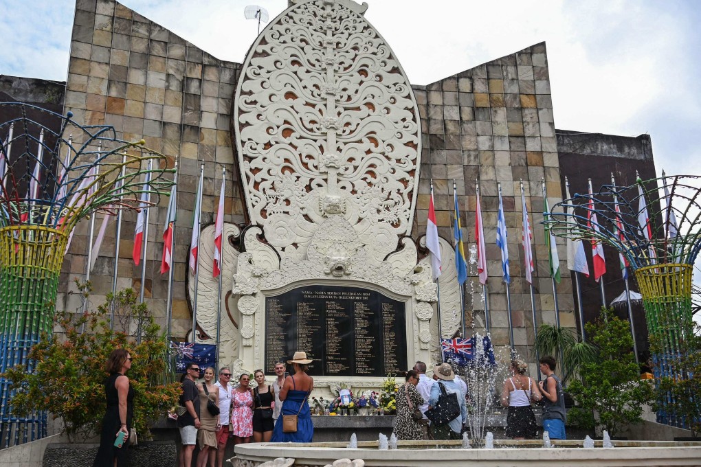 People visit a memorial site for the victims to mark the 20th anniversary of the Bali bombings in Kuta, Indonesia, on Wednesday. Photo: AFP