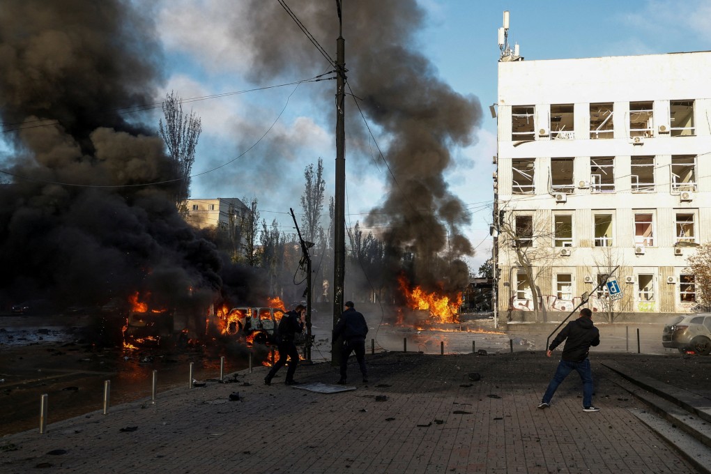 Cars are seen on fire after Russia’s missile attack in Kyiv, Ukraine, on October 10. Military analysts say it’s far from clear whether the strikes mark a turning point in a war that has killed thousands of Ukrainians and sent millions fleeing from their homes. Photo: Reuters