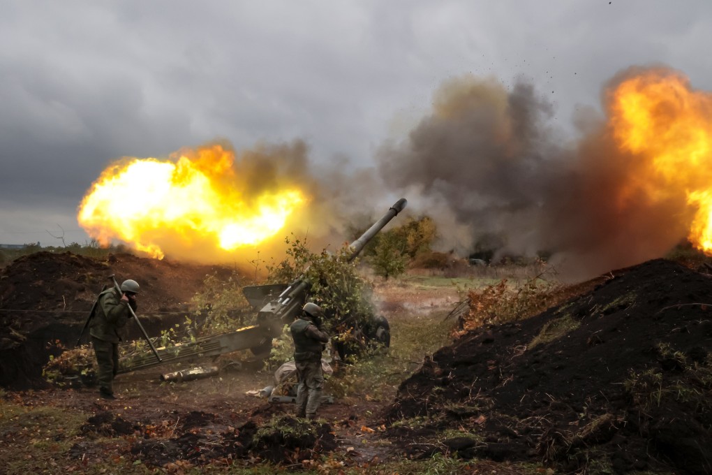 Servicemen fire a howitzer from their position at Ukrainian troops at an undisclosed location in Donetsk in eastern Ukraine on Tuesday. Photo: AP