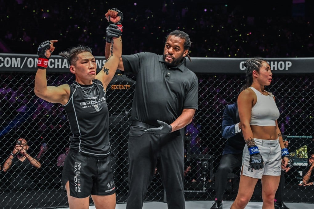 MMA referee Herb Dean makes Xiong Jingnan’s unanimous decision victory over Angela Lee official. Photos: ONE Championship.