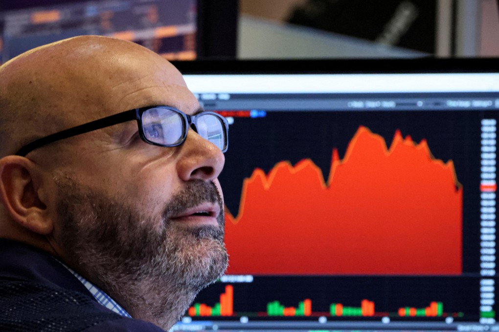 A trader works on the floor of the New York Stock Exchange in New York on October 7. Hopes for a rally in stocks after a difficult September faded after hawkish rhetoric from the US Federal Reserve quashed hopes of an end to interest rate increases. Photo: Reuters