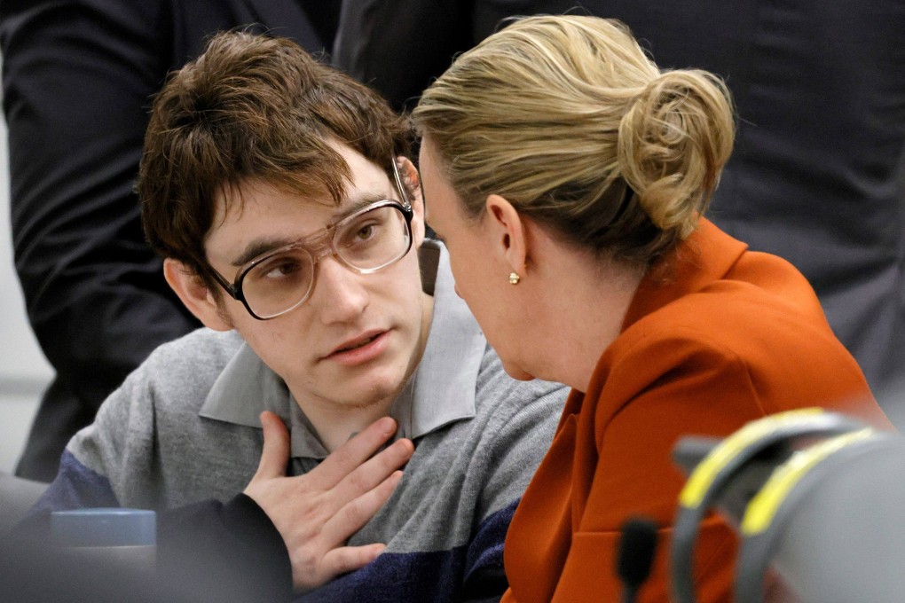 Parkland shooter Nikolas Cruz speaks with Assistant Public Defender Melisa McNeill as the verdicts are read in his trial in Fort Lauderdale, Florida, on Thursday. Photo: AFP
