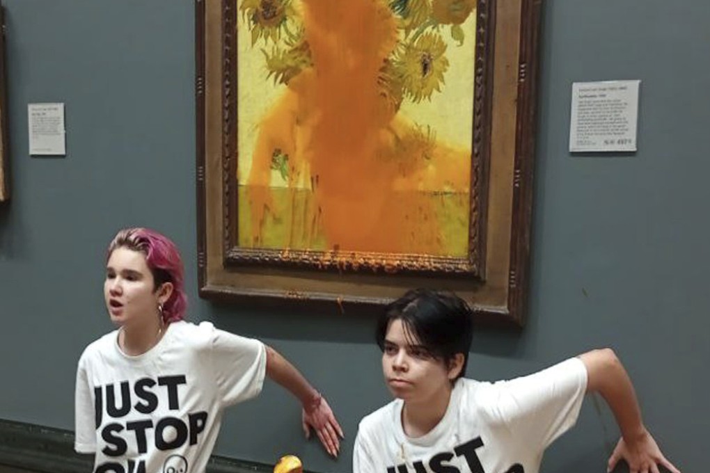 Just Stop Oil protesters threw tinned tomato soup over Vincent Van Gogh’s famous 1888 work Sunflowers at the National Gallery in London. Photo: AP