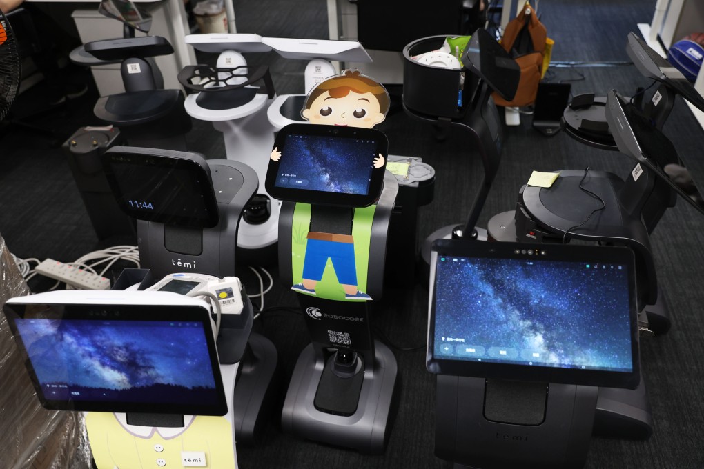 Robots used in care homes to check temperatures allow residents to contact their families, listen to music and play games. Photo: Yik Yeung-man