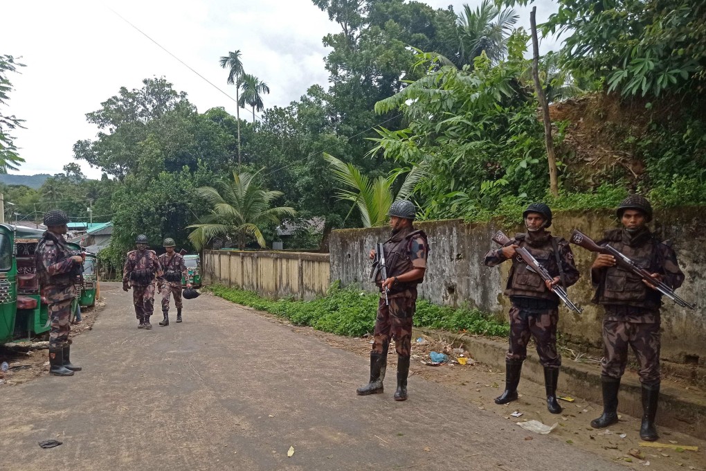 Members of Border Guards Bangladesh personnel stand guard along a street at Bandarban on September 19, 2022. Photo: AFP