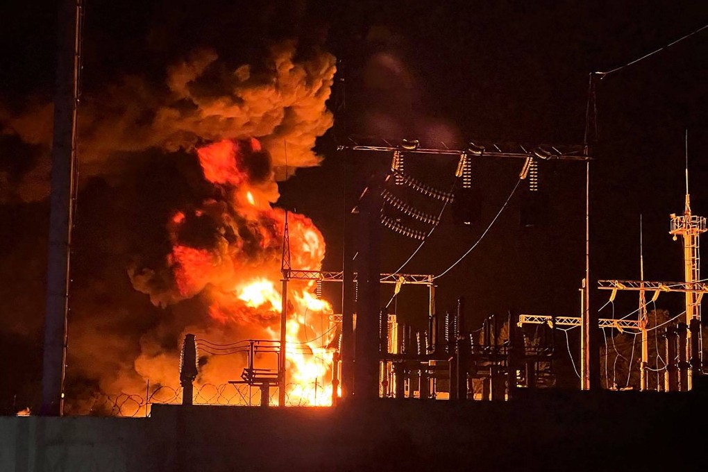A photograph posted on the Telegram account of the governor of Russia’s Belgorod region shows flames coming from a power station in Belgorod following Ukrainian shelling on Saturday. Photo: Telegram / Vvgladkov / AFP