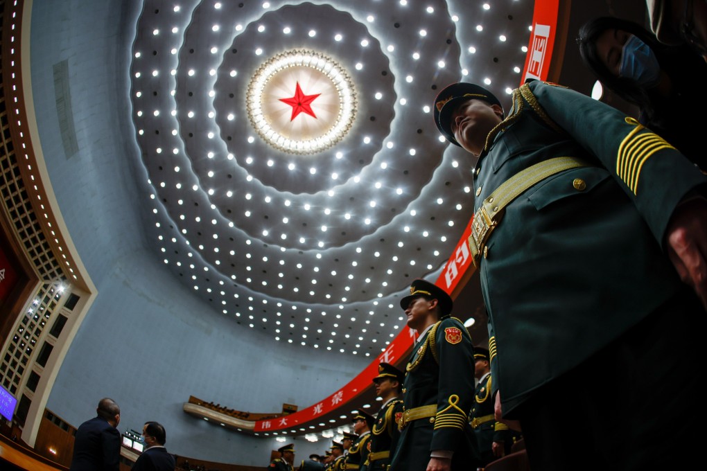 Military band members stand at attention during the opening ceremony of the 20th national congress of the Communist Party of China, at the Great Hall of the People in Beijing on October 16. Photo: EPA-EFE