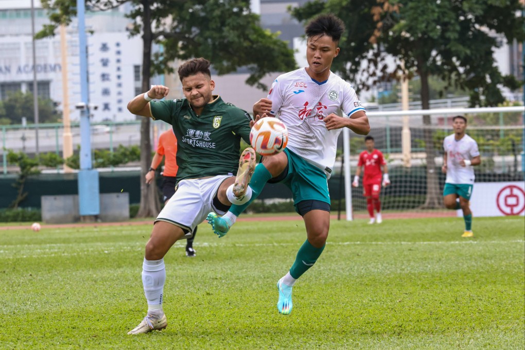 Sham Shui Po’s Stefan Antonic (left) and Tai Po’s Chung Wai-keung battle for the ball during their side’s Hong Kong Premier League game. Photo: K. Y. Cheng