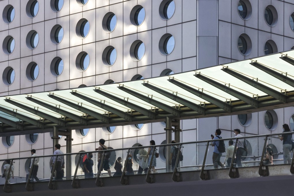 People head to work in Hong Kong’s Central district on September 14. The long-term fundamentals that underpin Hong Kong’s success remain unchanged. Photo: Jonathan Wong