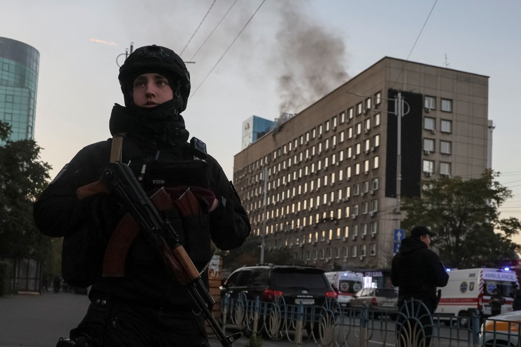 Police stand guard in Kyiv, where drone strikes and explosions were reported on Monday. Photo: Reuters