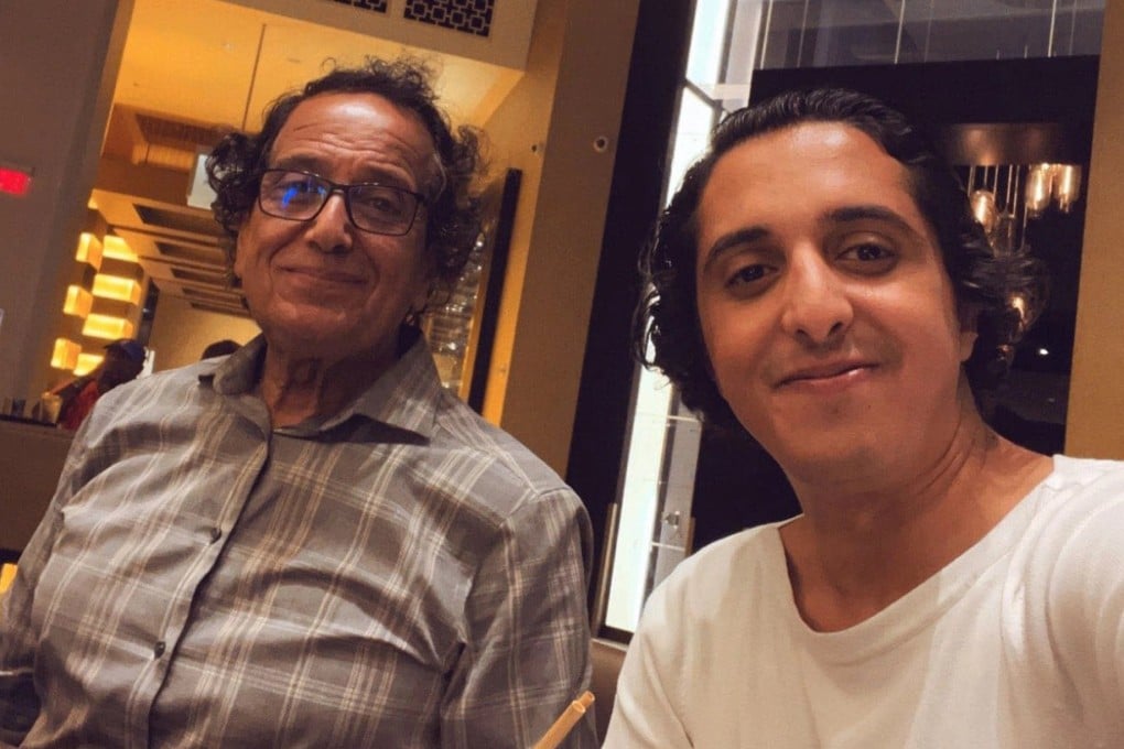 Saad Ibrahim Almadi with his son, Ibrahim. Photo: Ibrahim Almadi via Twitter