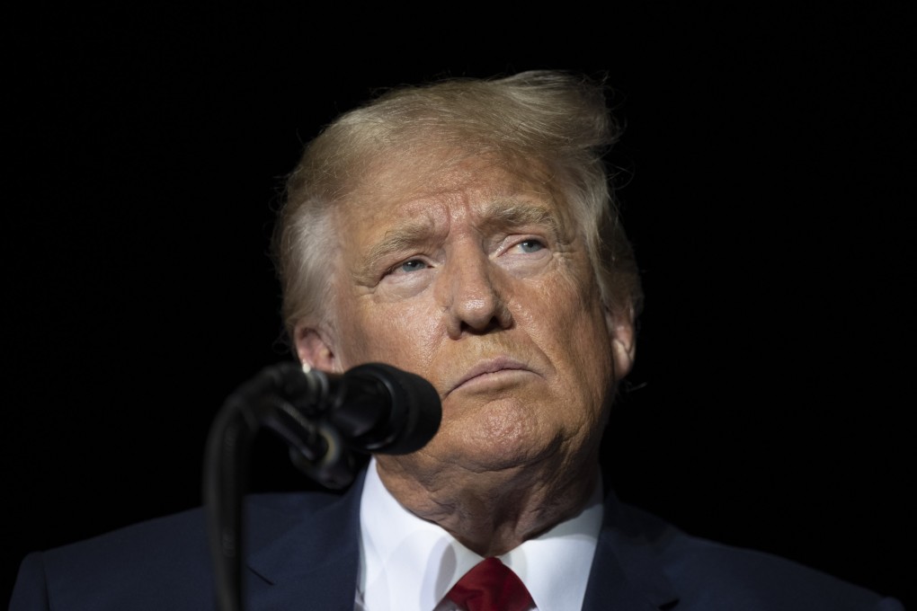 Former US president Donald Trump pauses while speaking at a rally at the Minden Tahoe Airport in Nevada on October 8. Photo: AP