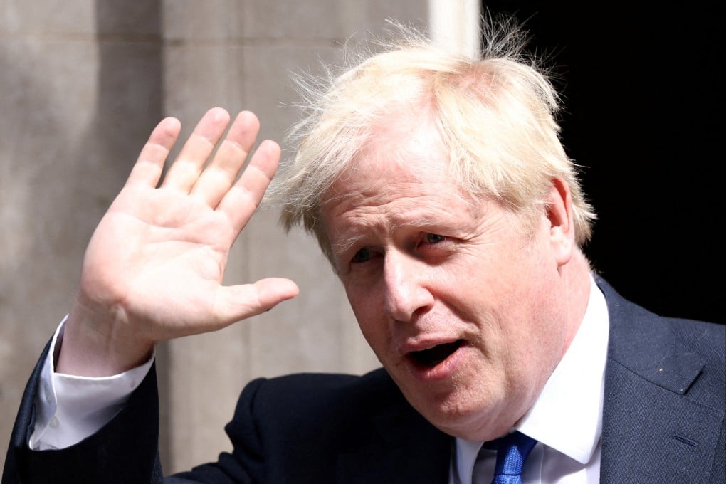 Then British Prime Minister Boris Johnson walks at Downing Street in London in July. Photo: Reuters