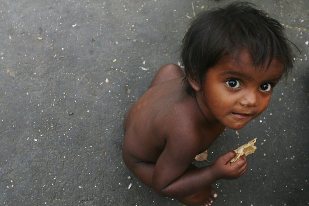 A boy in a Mumbai slum. More than 180 million Indians, including children, are undernourished. File photo: Reuters