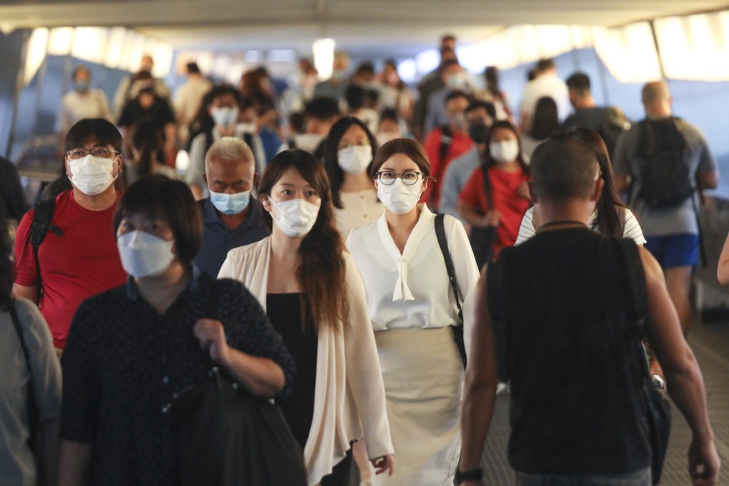 People walk on a footbridge in Central in August. Photo: Xiaomei Chen
