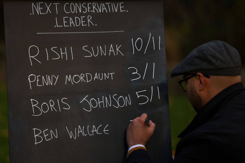 A bookmaker writes the voting odds for the next leader of the Conservative Party, and future UK prime minister, in the Westminster district of London on Thursday. Photo: Bloomberg