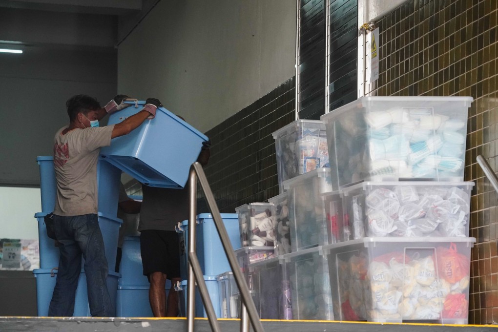 National security police collect evidence after the arrest of a Student Politicism member in 2021. Photo: Felix Wong