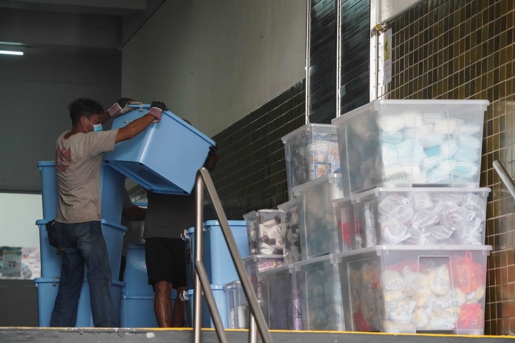 National security police collect evidence after the arrest of a Student Politicism member in 2021. Photo: Felix Wong