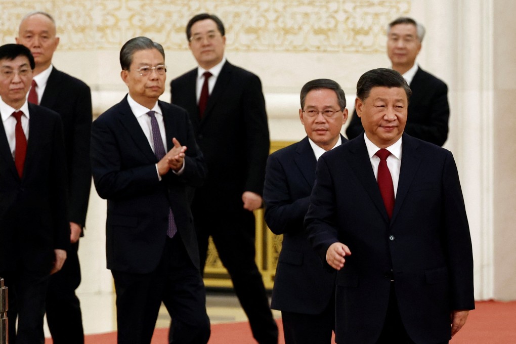 Members of the 20th Politburo Standing Committee Xi Jinping, Li Qiang, Zhao Leji, Wang Huning, Cai Qi, Ding Xuexiang and Li Xi arrive to meet the media following the 20th National Congress of the Communist Party of China, at the Great Hall of the People in Beijing on Sunday. Photo: Reuters