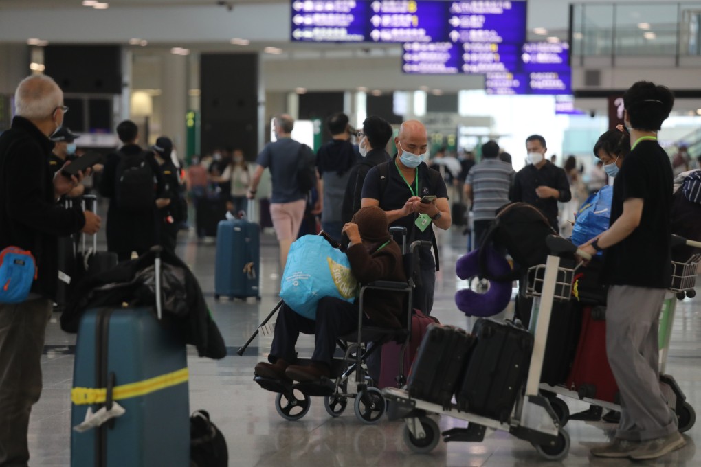 Passengers arrive at Hong Kong International Airport on October 7, after hotel quarantine was lifted for all arrivals. Photo: Xiaomei Chen