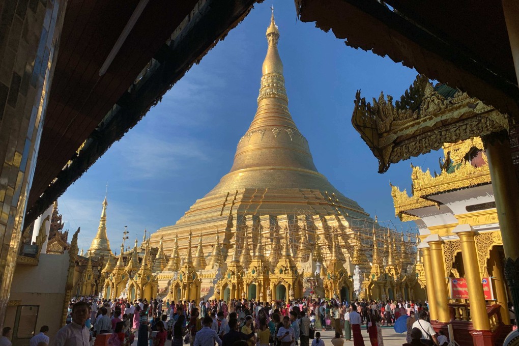 Myanmar devotees charged over sex doll stunt at holiest Buddhist shrine | South China Morning Post Myanmar devotees charged over sex doll stunt at holiest Buddhist shrine | South China Morning Post