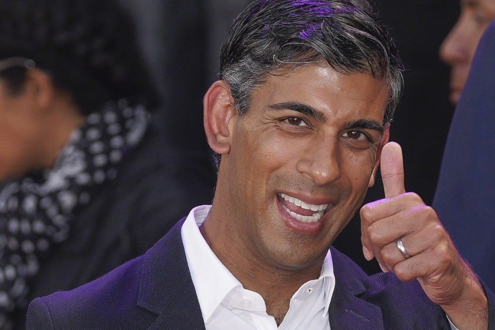 Rishi Sunak poses for photographers upon arriving at an event in London on October 5. Photo: AP