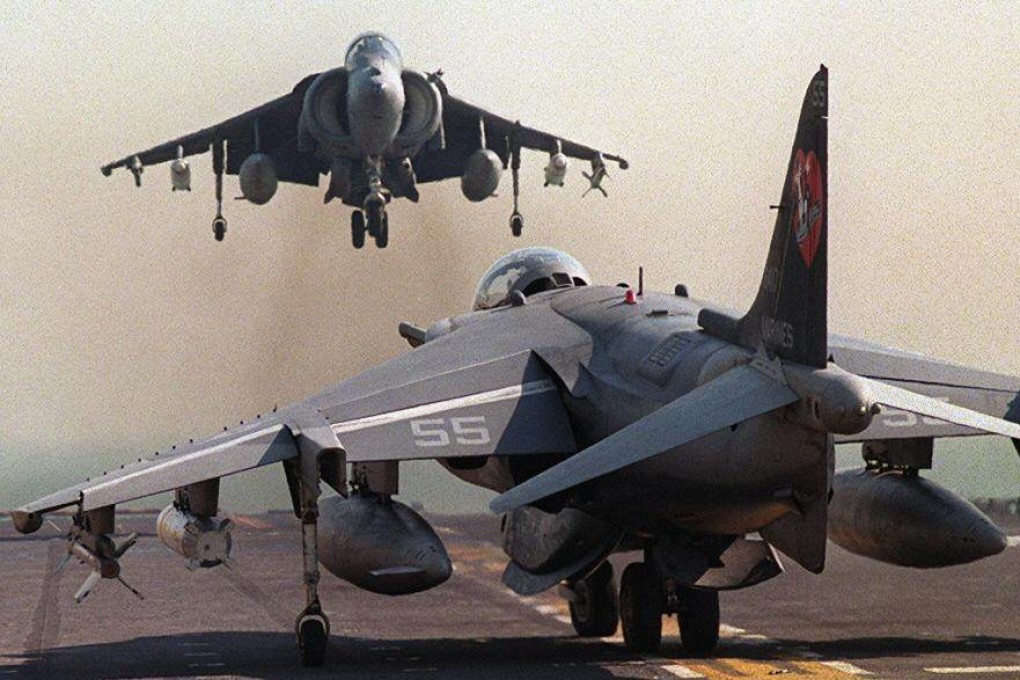 A US Harrier jump jet lands aboard an aircraft carrier in the Middle East. Daniel Edmund Duggan reportedly flew Harrier jets in the US Marines and was an air combat instructor. Photo: AFP