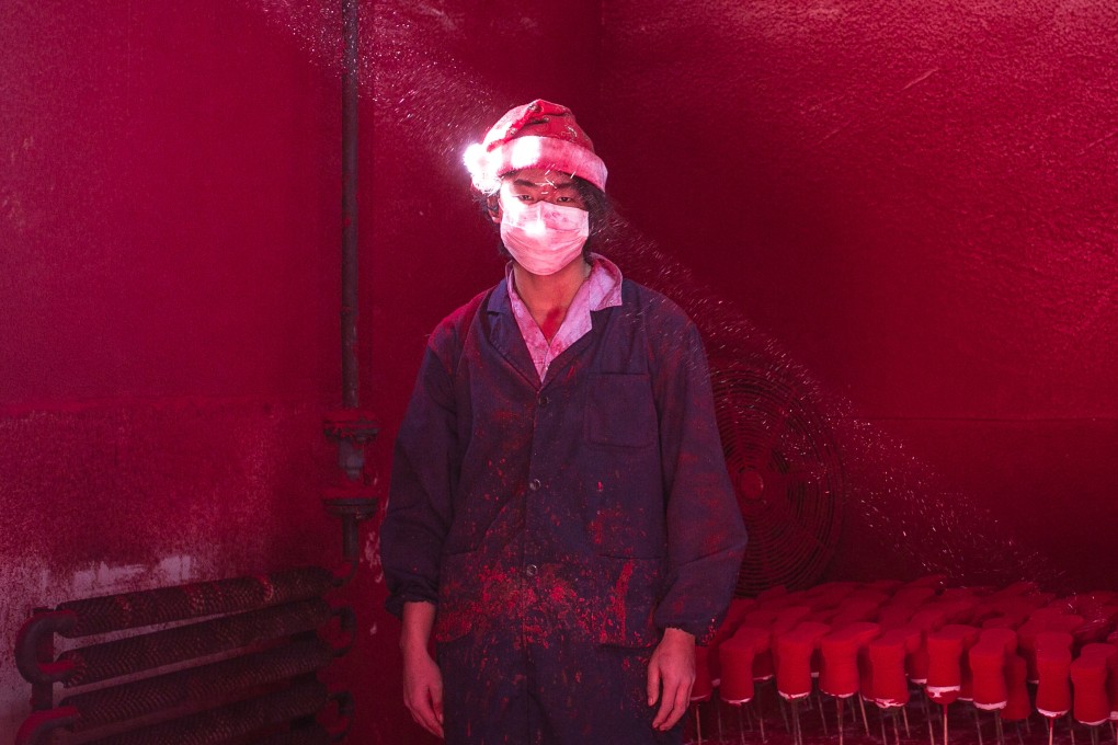 Christmas Factory, a shot of a worker making decorations in Yiwu, in China’s  Zhejiang province, that won Chen Ronghui second prize in the Contemporary Issues category at the 2015 World Press Photo awards. Photo: Chen Ronghui