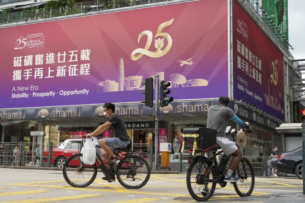 Cyclists on Nathan Road in Tsim Sha Tsui on June 21. Photo: Felix Wong