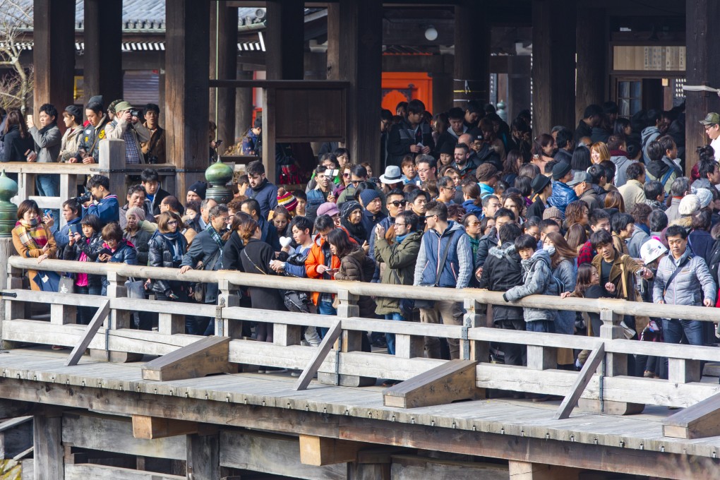 Crowds throng Kiyomizu-dera, a temple in Kyoto, Japan, in 2017. Kyoto is bracing for international tourists once again after Japan opened its borders arrivals on October 11. Photo: Shutterstock
