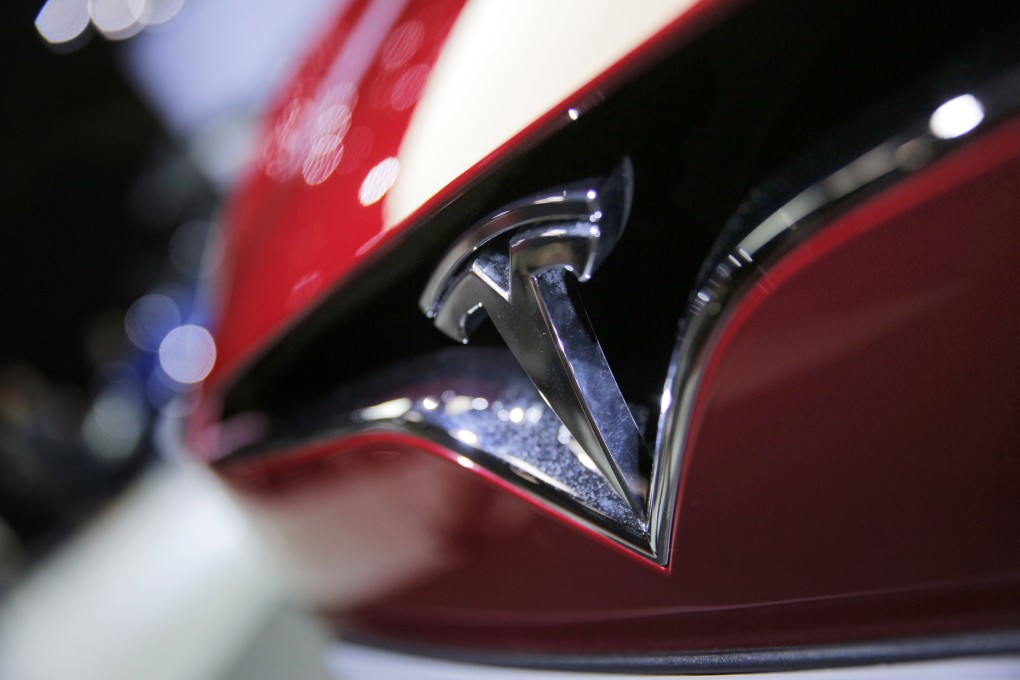 The Tesla logo seen on its Model S vehicle at the Paris Auto Show on September 30, 2016. Photo: AP