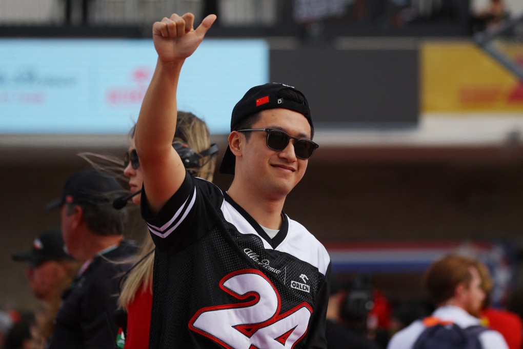 Alfa Romeo’s Zhou Guanyu acknowledges the spectators at US Grand Prix. Photo: Reuters