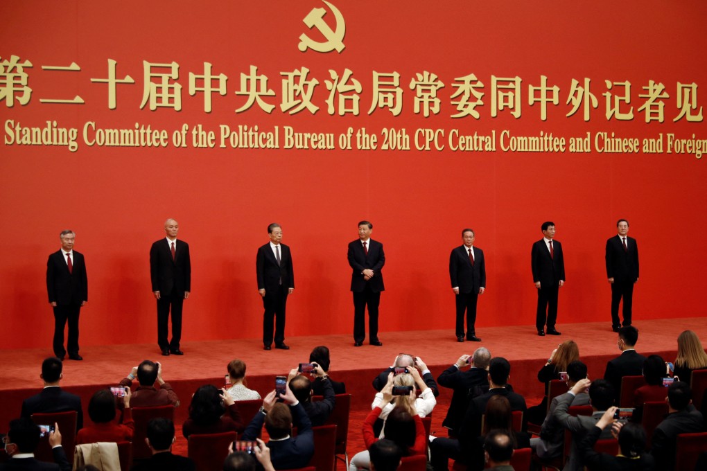 New Politburo Standing Committee members Xi Jinping, Li Qiang, Zhao Leji, Wang Huning, Cai Qi, Ding Xuexiang and Li Xi meet the media following the 20th National Congress. Photo: Reuters