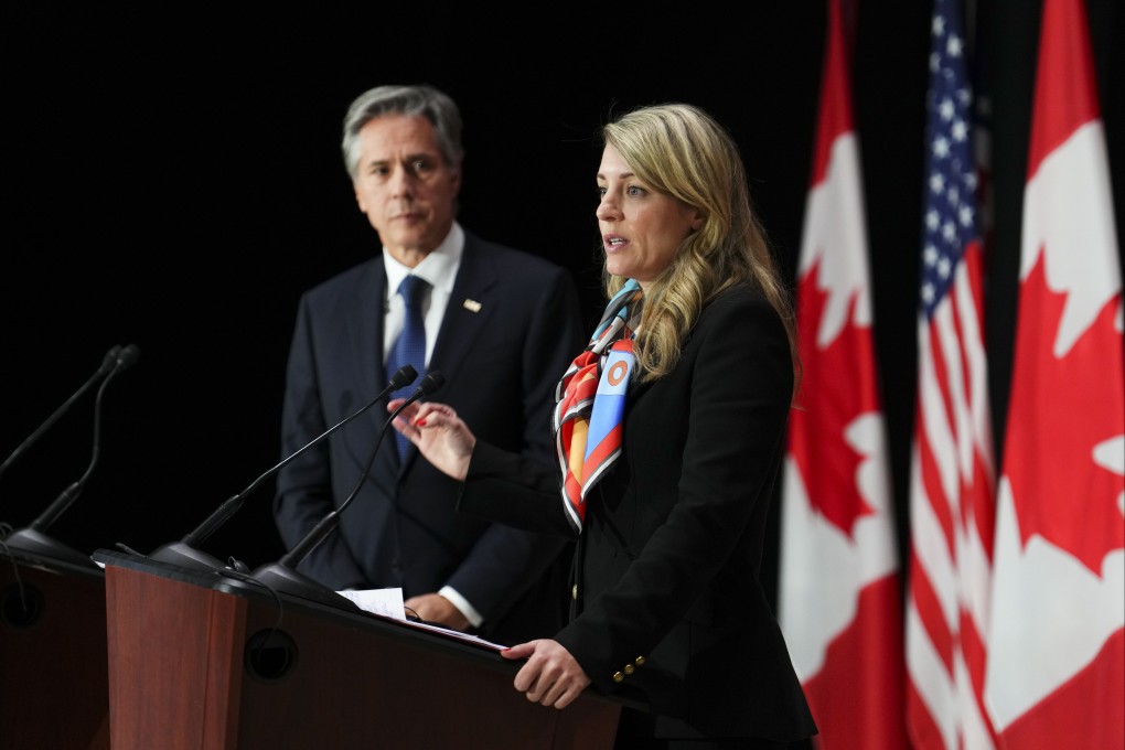 US Secretary of State Antony Blinken listens as Canadian Foreign Minister Melanie Joly speaks during a joint press conference following bilateral talks in Ottawa on Thursday. Photo: The Canadian Press via AP