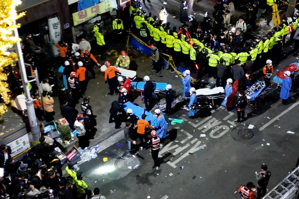 Rescue workers at the scene of the deadly stampede during Halloween festivities in Seoul’s popular nightlife district of Itaewon. Photo: Reuters