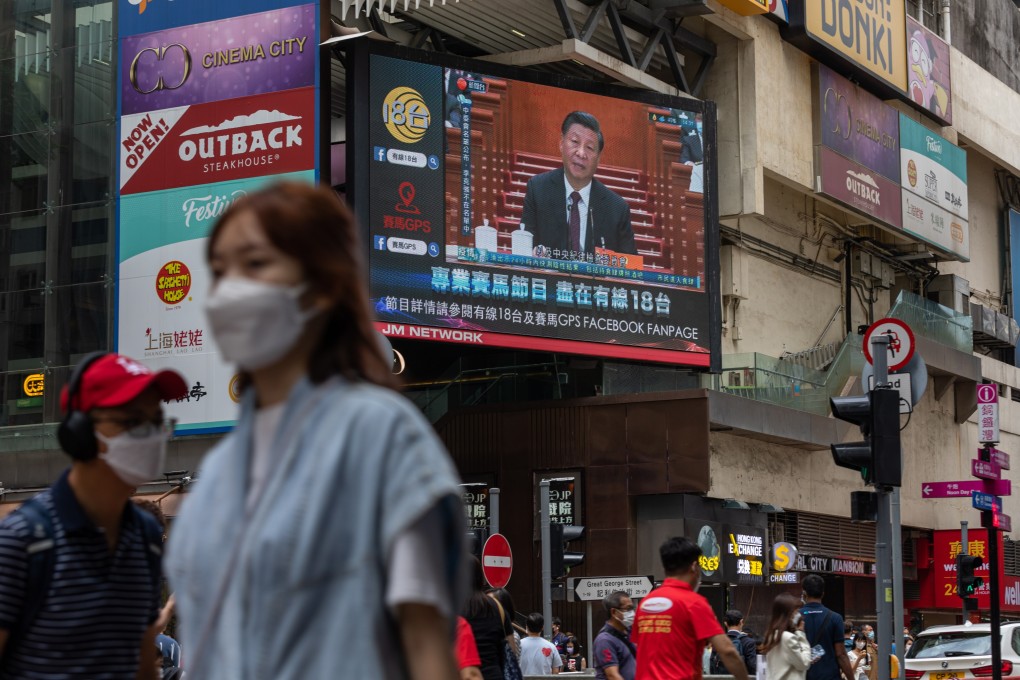 A screen in Hong Kong shows a news report about China’s President Xi Jinping addressing the 20th National Congress of the Communist Party of China (CPC) in Beijing on October 22. Photo: EPA-EFE