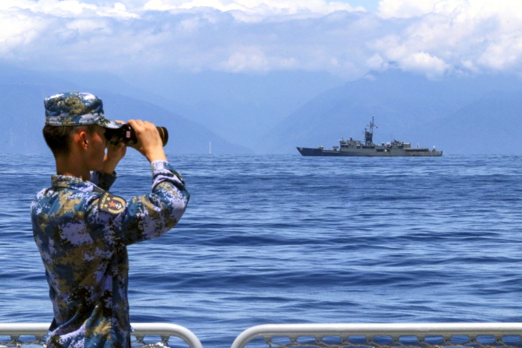 A soldier looks through binoculars during combat exercises of the People’s Liberation Army (PLA) in the waters around Taiwan. Photo: Xinhua