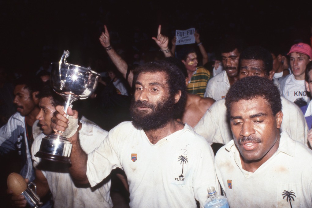 Tomasi Cama (with cup) leads the Fiji celebrations at the Hong Kong Sevens in 1991, but his legacy was secured the previous year. Photo: SCMP