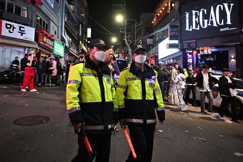 Police patrol the Itaewon neighbourhood of Seoul on Sunday, a day after the deadly Halloween crush took place. Photo: AFP
