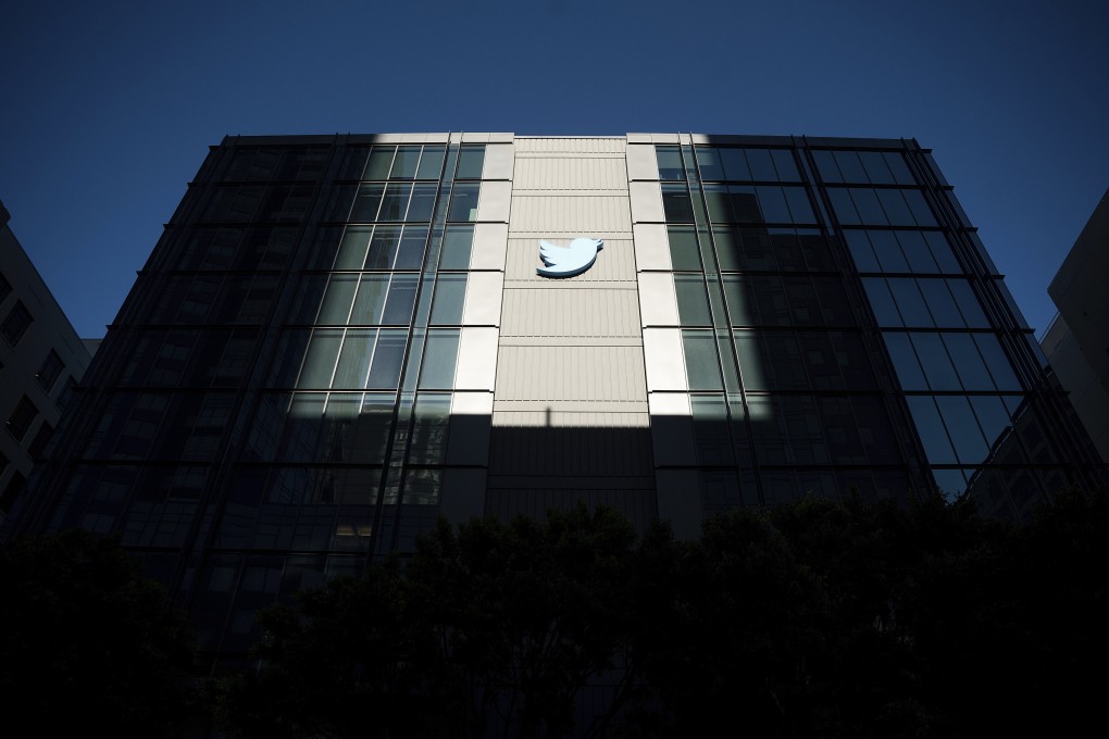 A Twitter logo hangs outside the company’s San Francisco offices on November 1, 2022. Photo: AP