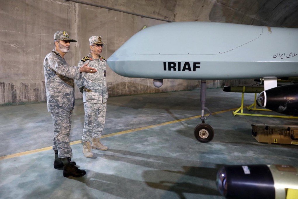 Commander-in-Chief of the Iranian Army Major General Abdolrahim Mousavi (left) and Armed Forces Chief of Staff Major General Mohammad Bagheri visit an underground drone base, in an unknown location in Iran, on May 28. Photo: Iranian Army office via AFP