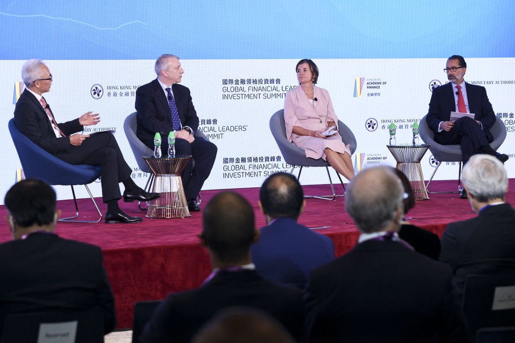 Howard Lee (left), Deputy CEO of HKMA moderates a panel at the Global Financial Leaders’ Investment Summit on Thursday. Stephen Klar of Wellington Management, Hanneke Smits of BNY Mellon Investment and Cyrus Taraporevala of State Street take part in the discussion. Photo: K.Y. Cheng