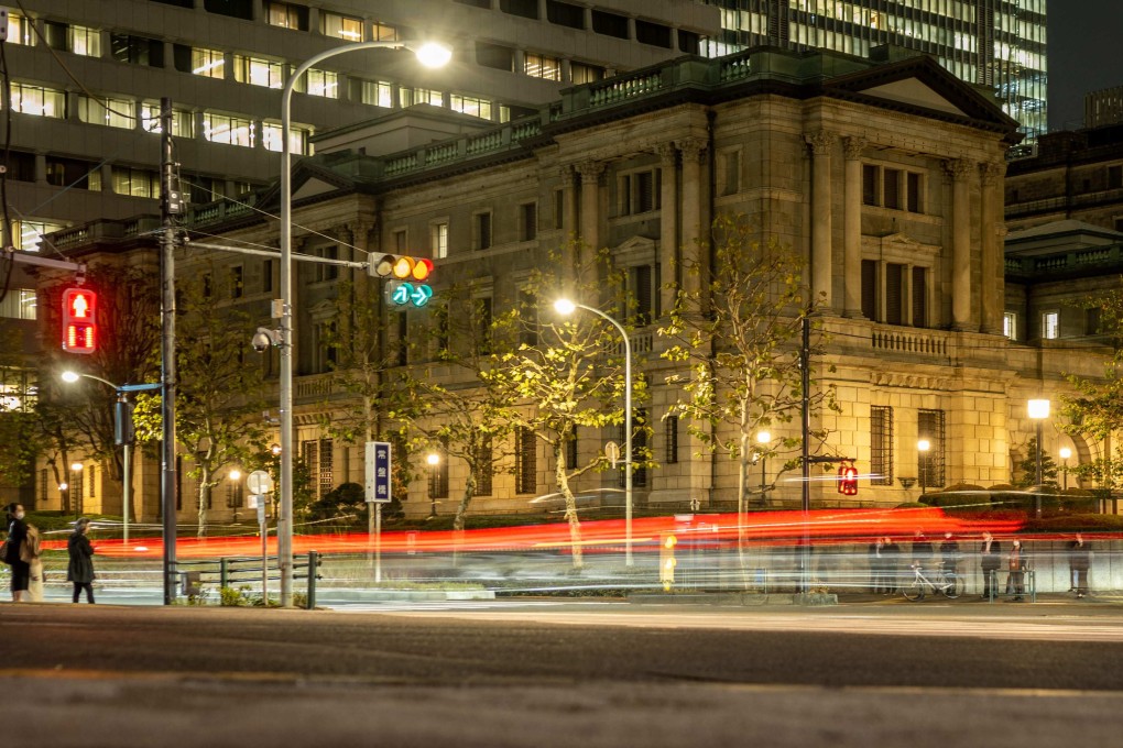 The headquarters of the Bank of Japan in Tokyo on October 27. The BOJ has kept its monetary policy super easy even in the face of a strong US dollar. A change in stance by Japan’s policymakers could signal difficult times ahead for global markets. Photo: AFP