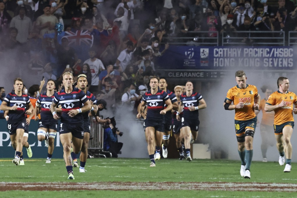 Hong Kong and Australia run onto the field on day 1 of the Cathay Pacific/HSBC Hong Kong Sevens. Photo: K. Y. Cheng