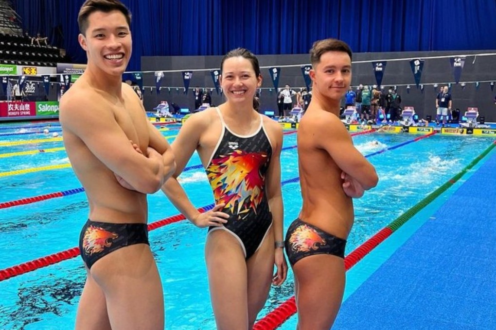 Siobhan Haughey, Ian Ho and Adam Chillingworth pose in swim suits designed by Haughey. Photo: Handout